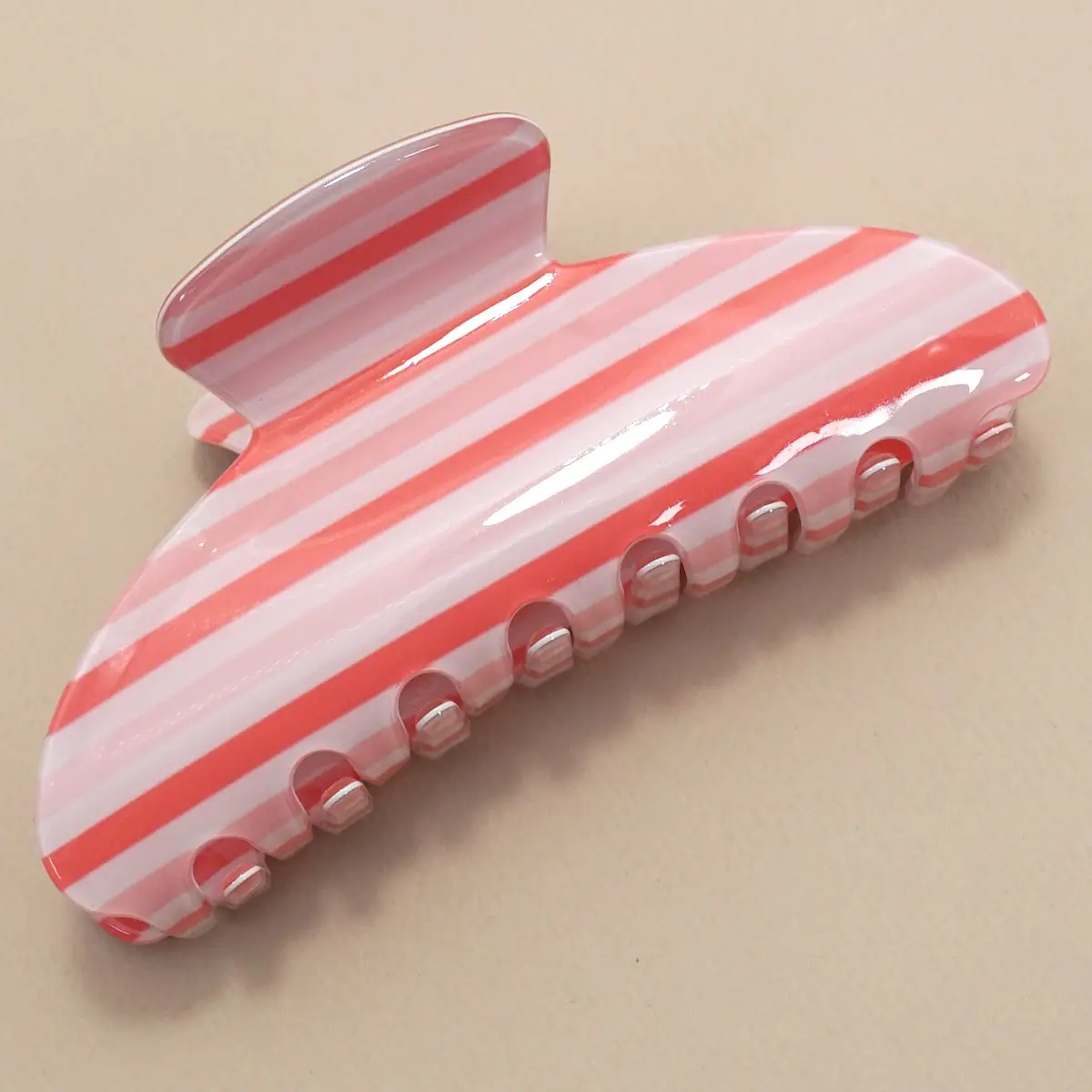 Coral and pink striped claw clip