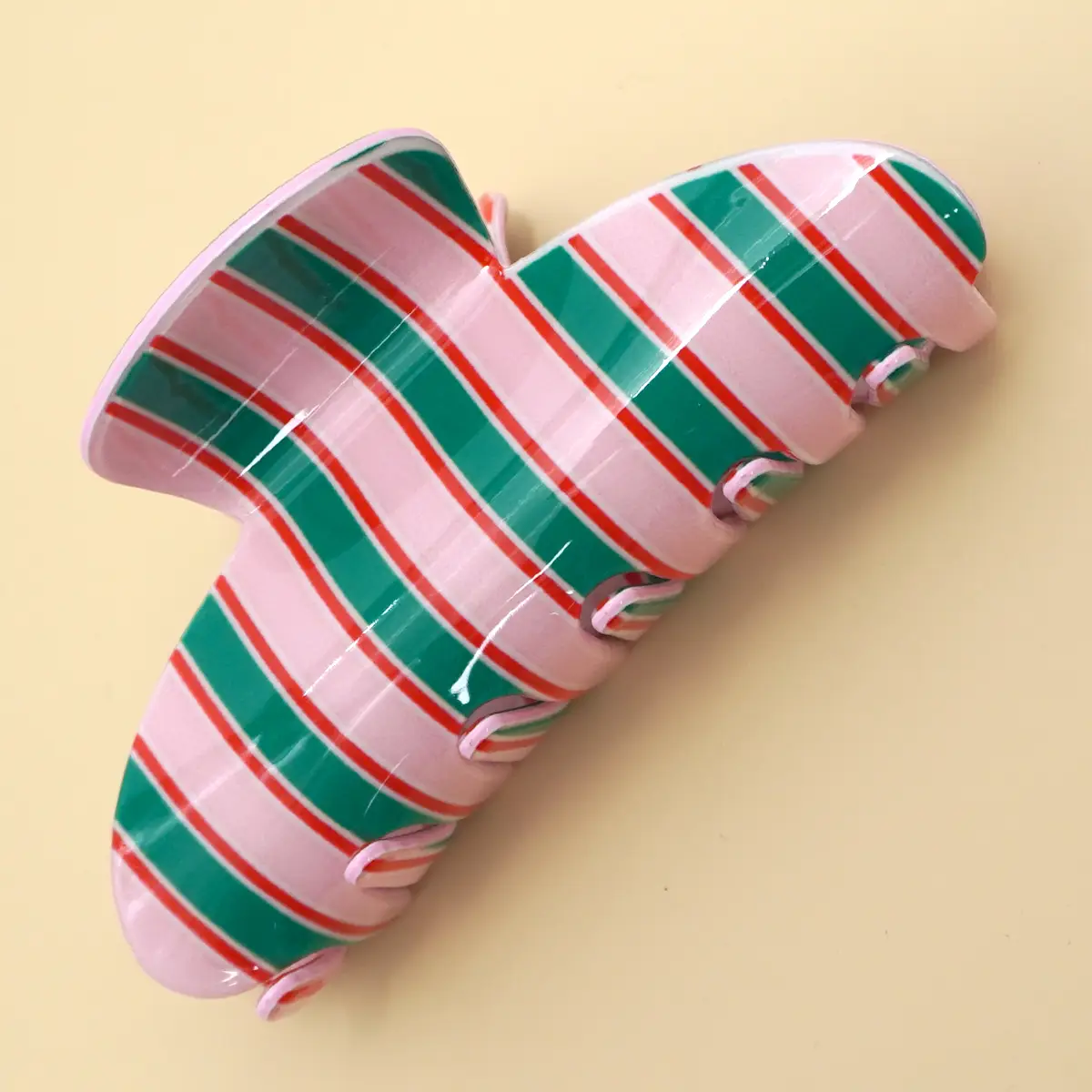 Pink and green striped claw clip